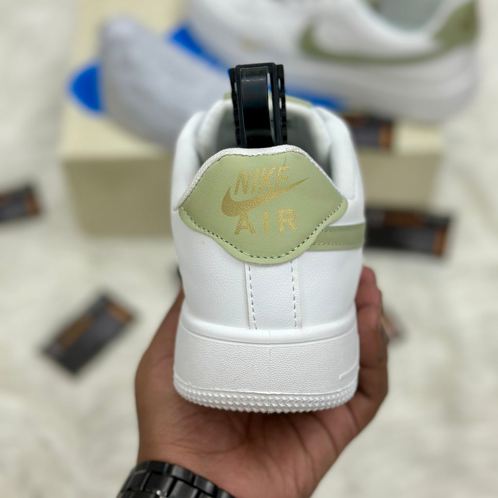 Nike Air Force 1 ’07 LV8 “Mini Swoosh” — White/Light Olive/Metallic Gold.