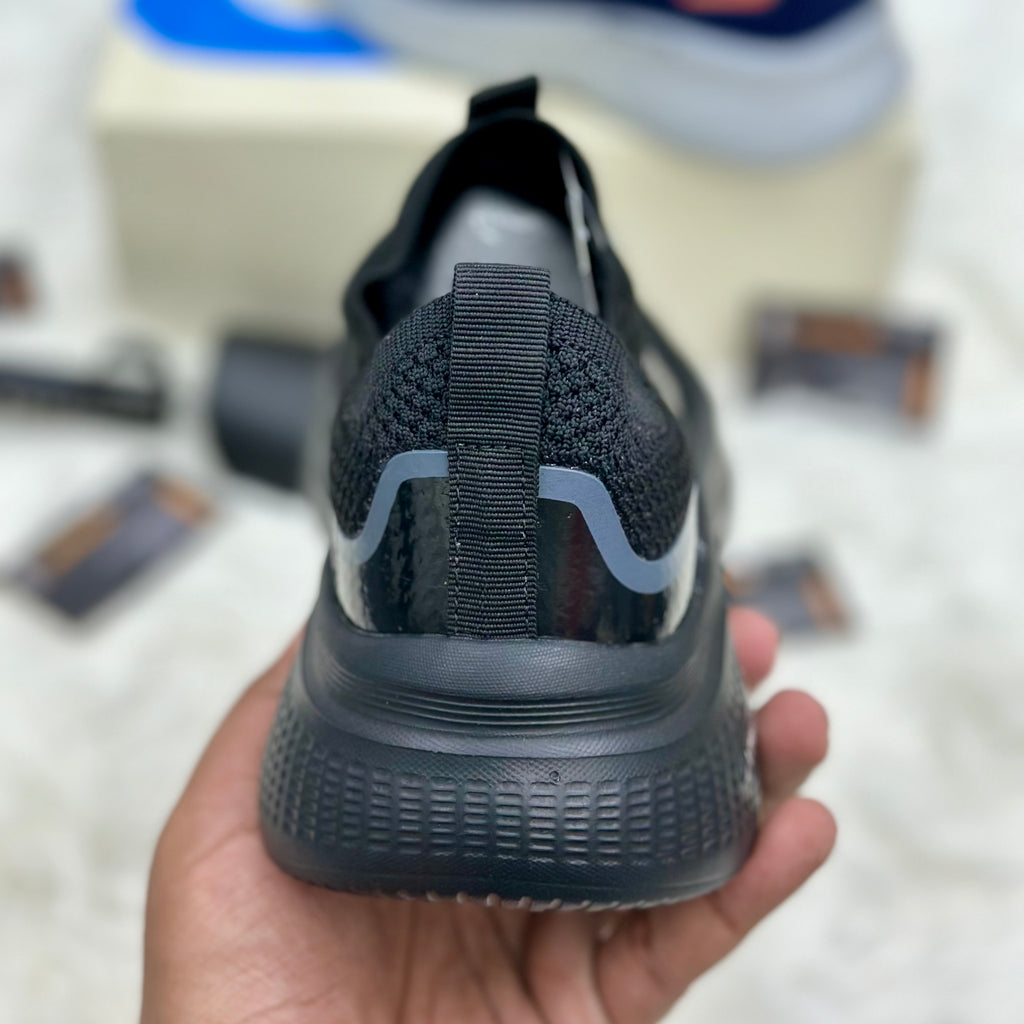 Skechers Go Walk Hyper Burst Slip-Ins — Triple Black.