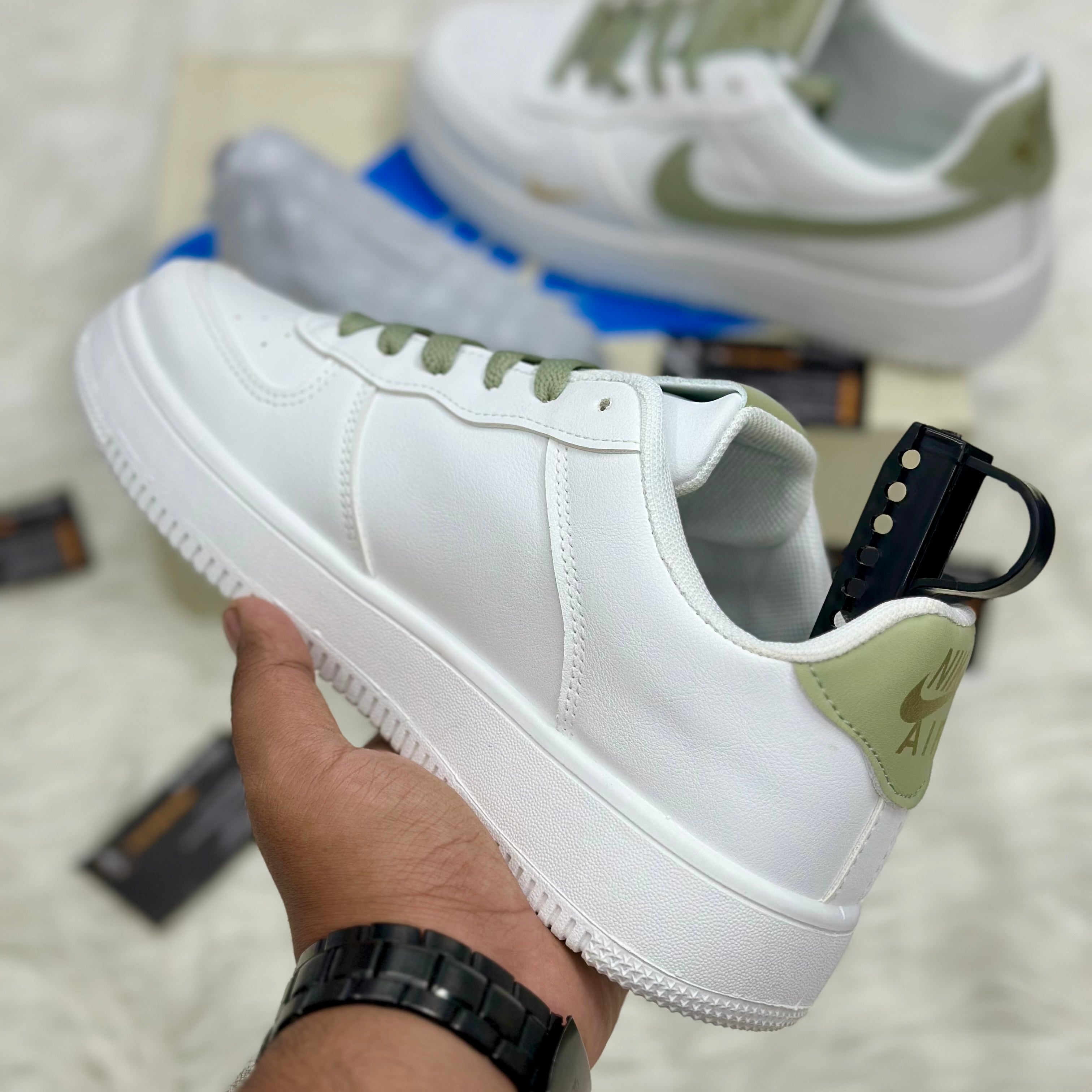 Nike Air Force 1 ’07 LV8 “Mini Swoosh” — White/Light Olive/Metallic Gold.