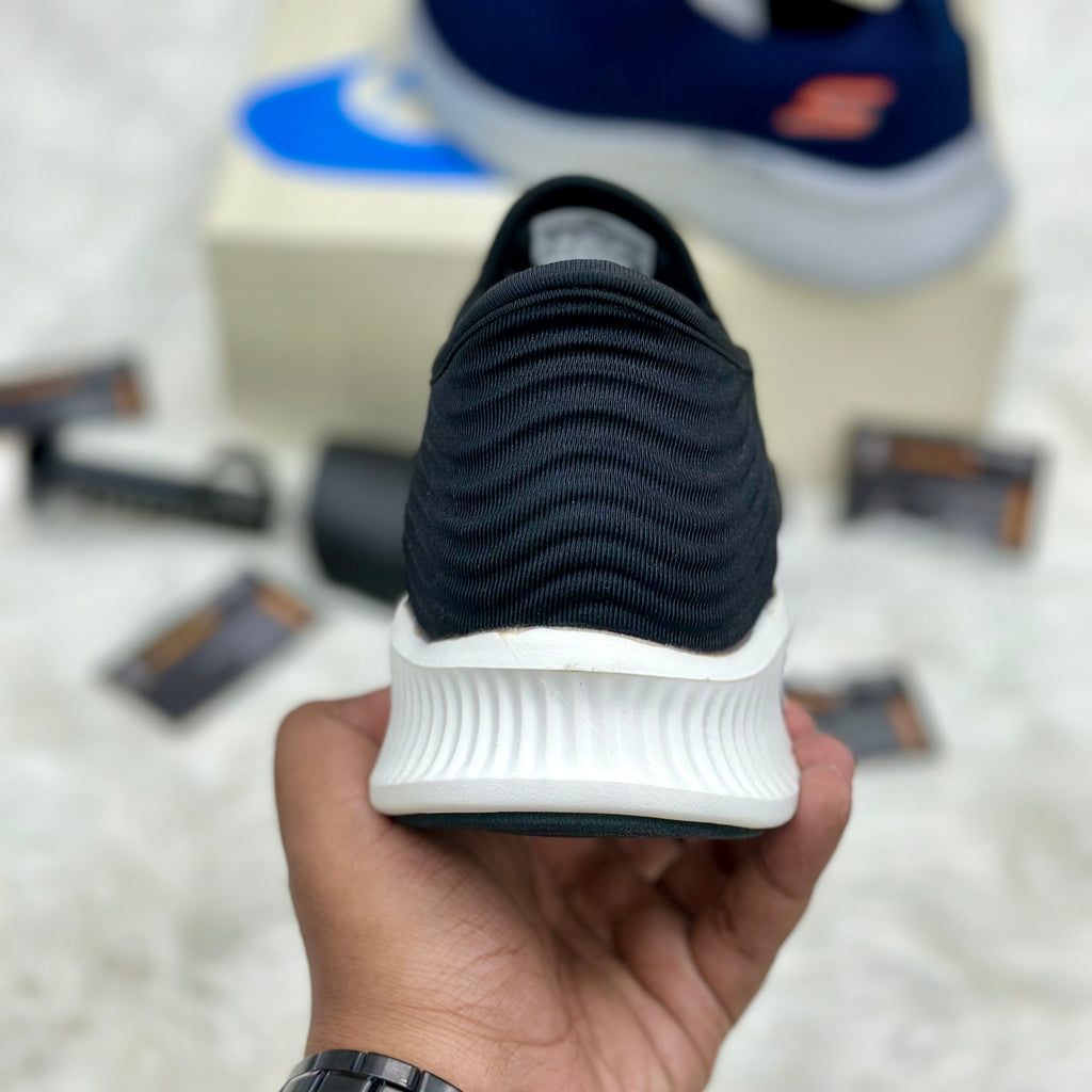 Skechers Go Walk Arch Fit Slip-Ins — Black/White.