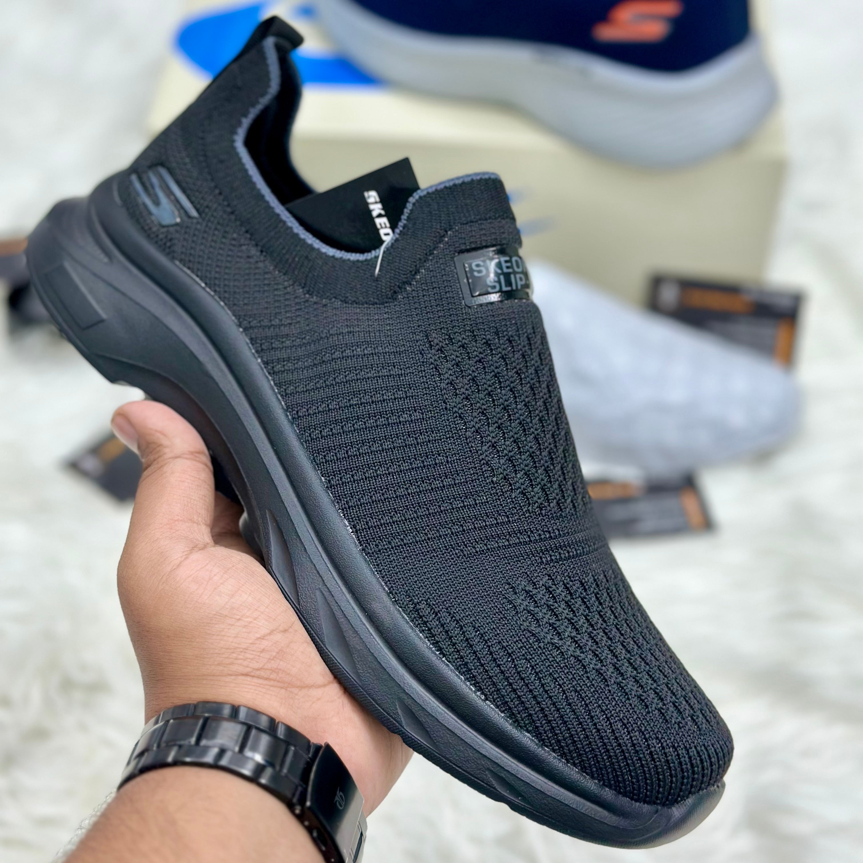 Skechers Slip-Ins Max Cushioning — Triple Black.